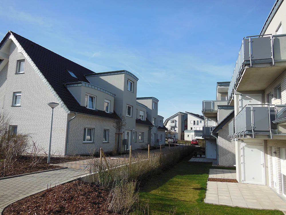 Moderne Wohnanlage als Referenz im Wohnungsbau f&uuml;r TGA-Planung mit Heizung, Sanit&auml;r, L&uuml;ftung und Elektrotechnik